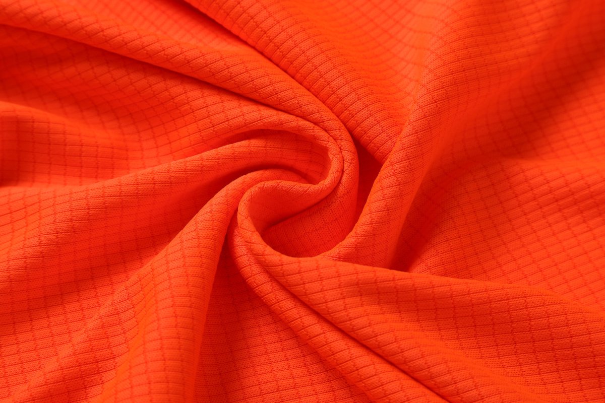 "Hi-Vis Long Sleeve Panel polo shirt fabric texture close-up – Big Bee Workwear"