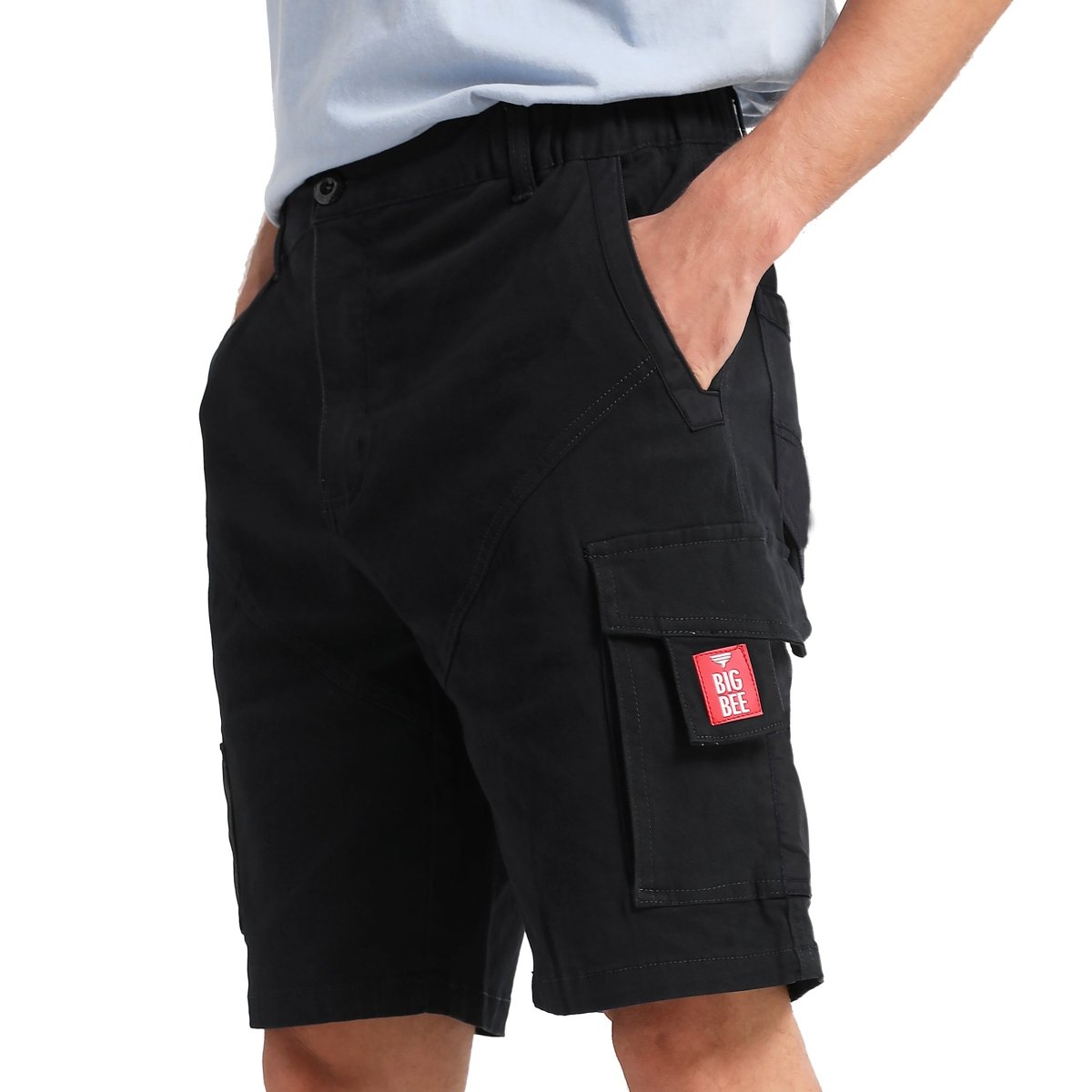 elite work shorts in black, model side – Big Bee Workwear