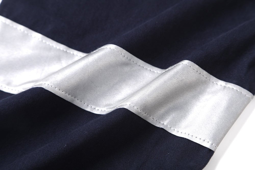 elite reflective work pants in navy reflective tape, fabric texture close-up – Big Bee Workwear