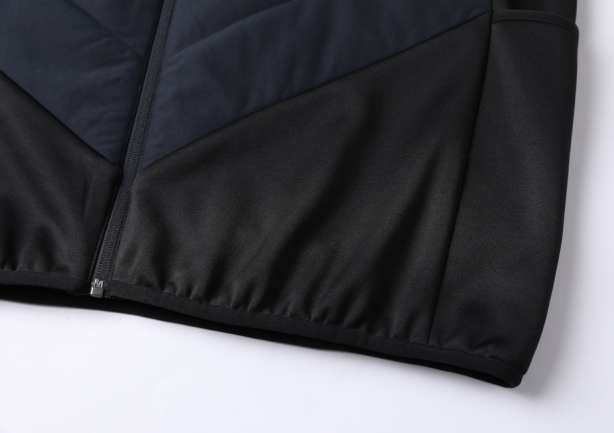 climb puffer vest hem detail close-up – ISUSI