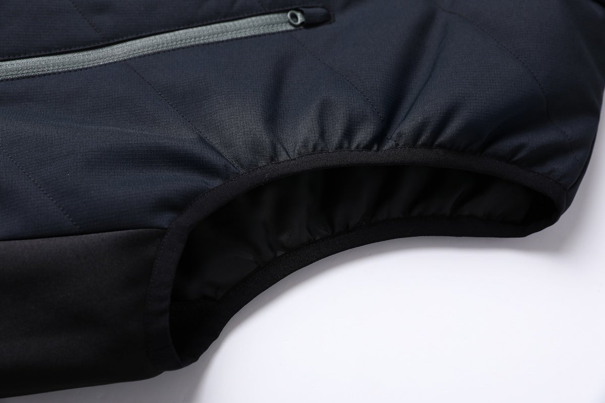 climb puffer vest side detail close-up – ISUSI