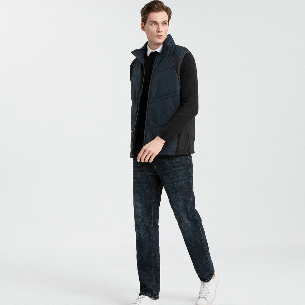 elite puffer vest in blue-navy, model walking pose – ISUSI