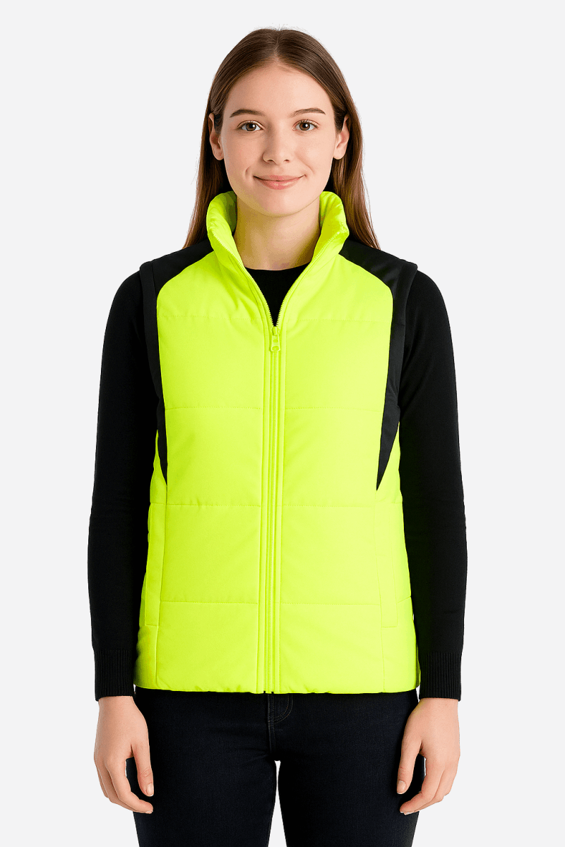 ladies strike puffer vest in yellow, model posed – ISUSI