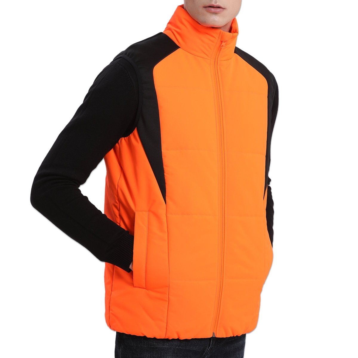 strike puffer vest in orange, model posed – ISUSI