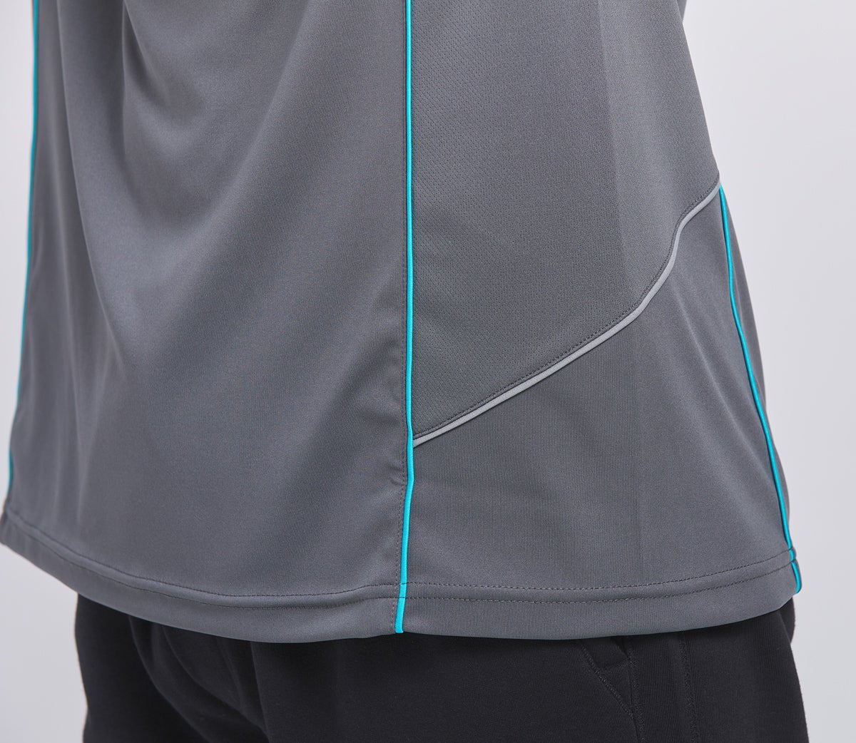 flow polo shirt hem detail close-up – Big Bee Workwear