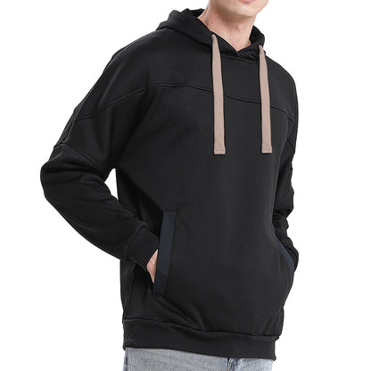"fly hoodie in Black with gold champagne, model side – Big Bee Workwear"