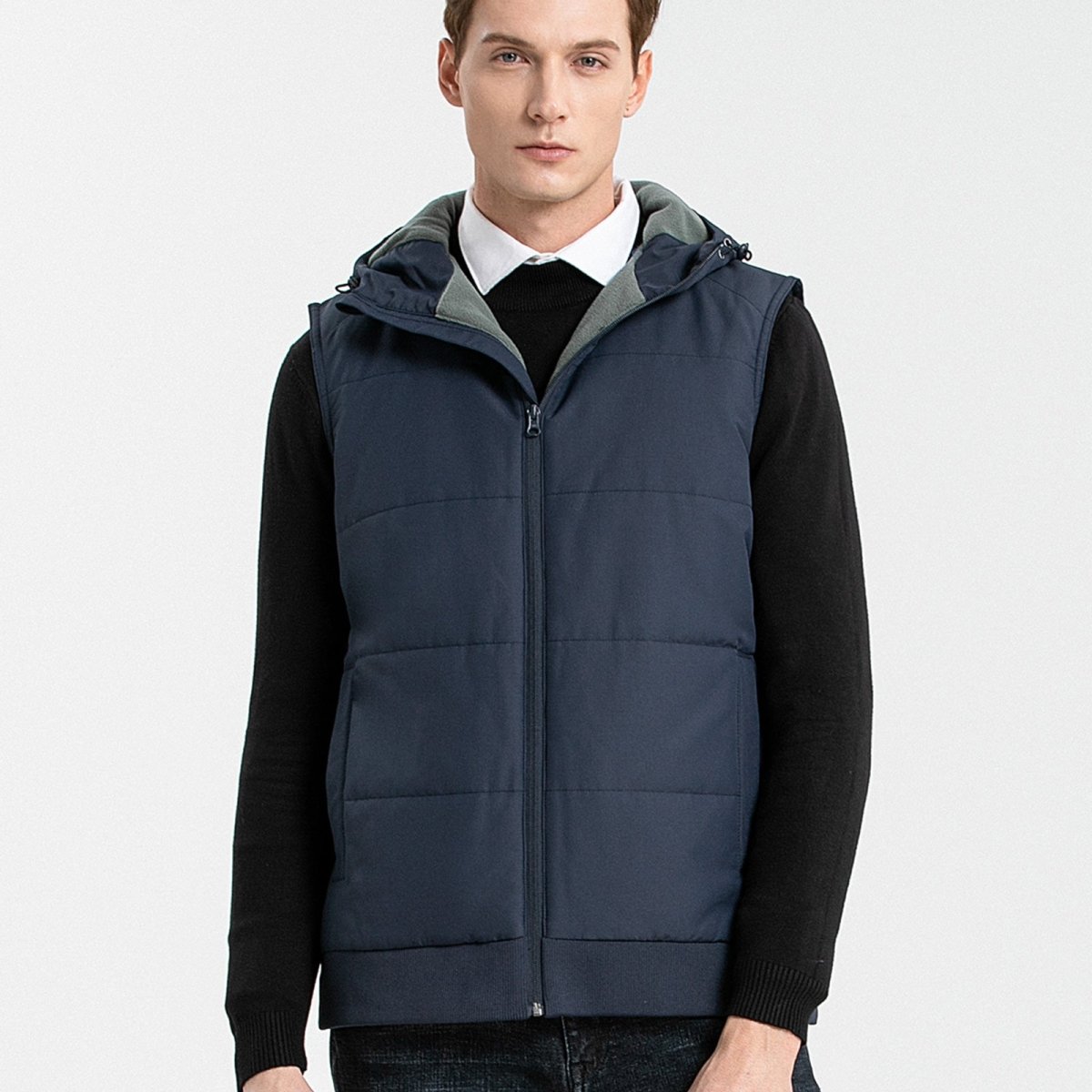"essential puffer vest in blue-navy, model front – ISUSI"