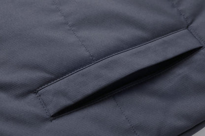 "essential puffer vest pocket detail close-up – ISUSI"