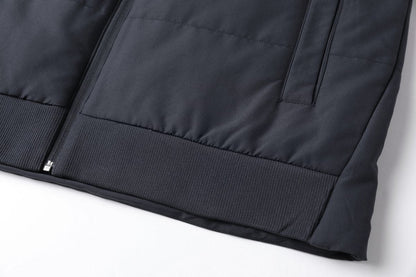 "essential puffer vest hem detail close-up – ISUSI"