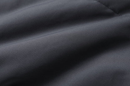 "essential puffer vest fabric texture close-up – ISUSI"