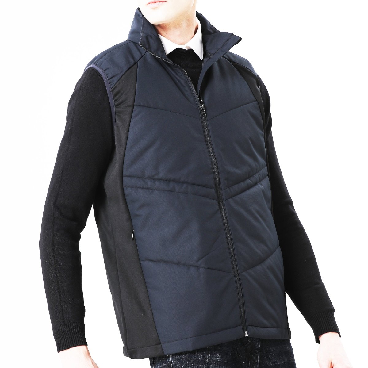 "elite puffer vest in blue-navy, model posed – ISUSI"