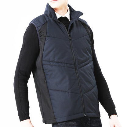 "elite puffer vest in blue-navy, model posed – ISUSI"
