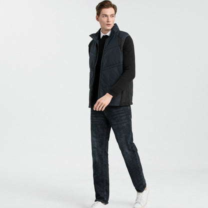 "elite puffer vest in black, model walking pose – ISUSI"