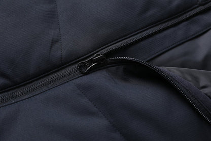 "elite puffer vest zipper detail close-up – ISUSI"