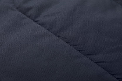 "elite puffer vest fabric texture close-up – ISUSI"