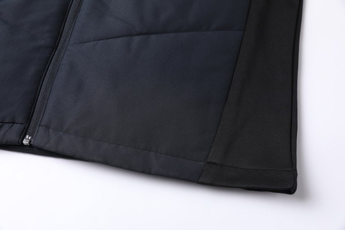 "elite puffer vest hem detail close-up – ISUSI"