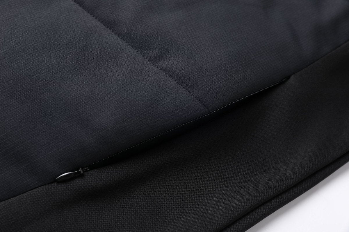 "elite puffer vest pocket detail close-up – ISUSI"
