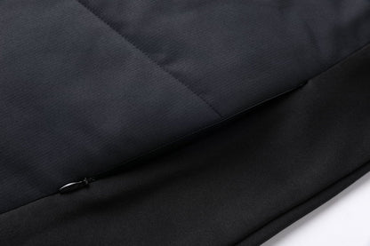 "elite puffer vest pocket detail close-up – ISUSI"