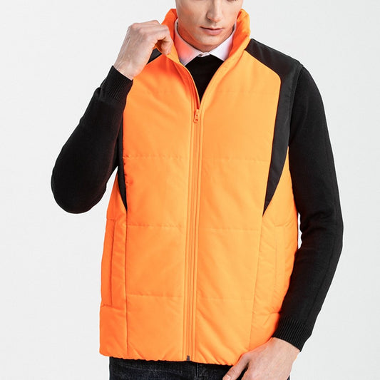 "strike puffer vest in orange, model front – ISUSI"