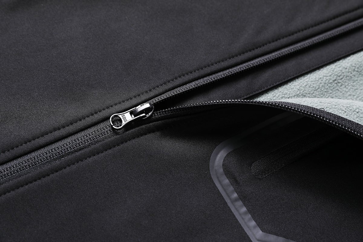 "i.t. softshell vest zipper detail close-up – ISUSI"