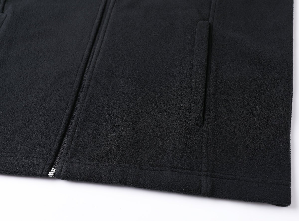 "easy fleece vest hem detail close-up – ISUSI"