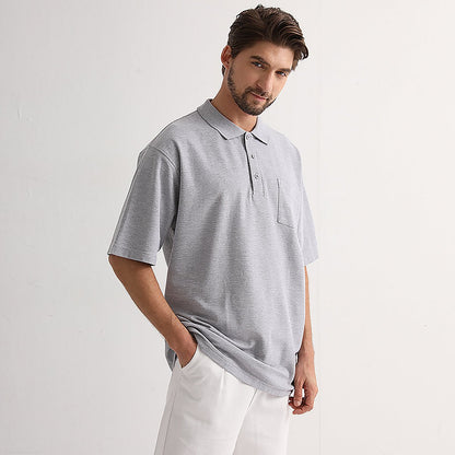 "cotton blend polo shirt in grey, model in action – Big Bee Workwear"