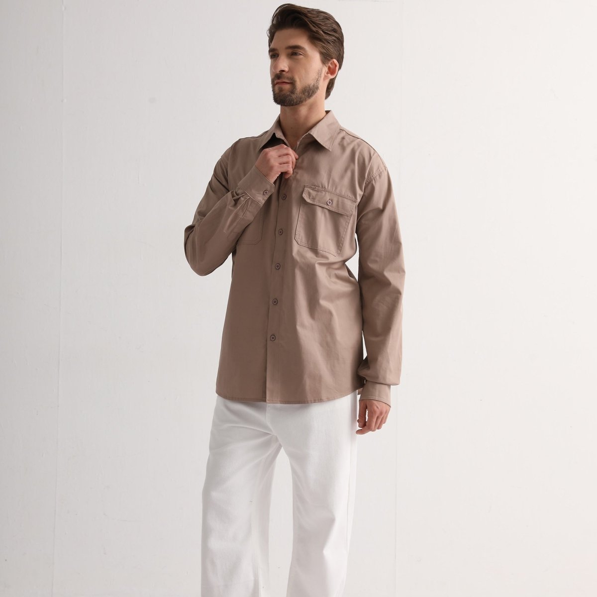 "Men’s Lightweight Cotton Work shirt in khaki, Long Sleeve, model posed – Big Bee Workwear"