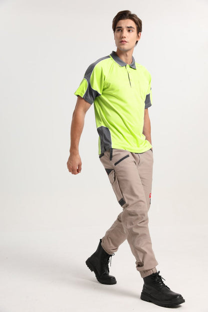 "Hi-Vis Short Sleeve Panel polo shirt in yellow with grey charcoal, model posed – Big Bee Workwear"
