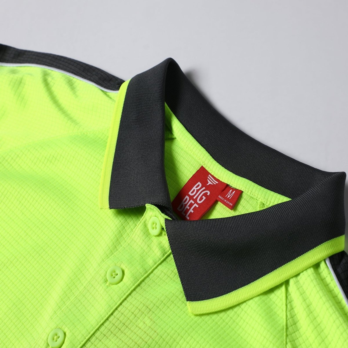 "Hi-Vis Short Sleeve Panel polo shirt button detail close-up – Big Bee Workwear"