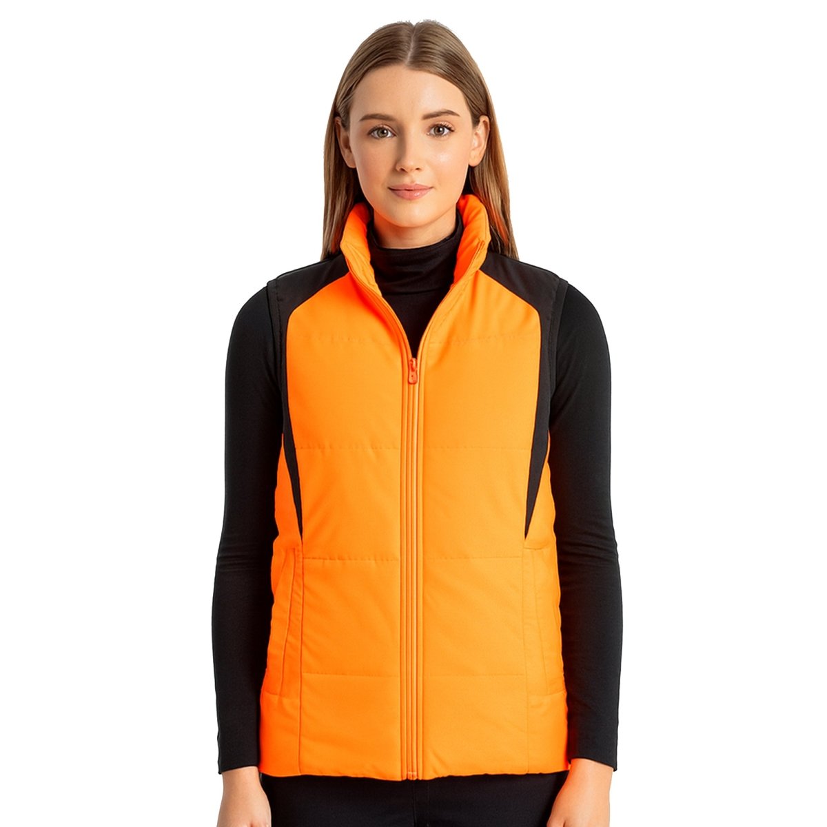 "ladies strike puffer vest in orange, model front – ISUSI"