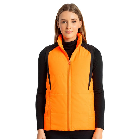 "ladies strike puffer vest in orange, model front – ISUSI"