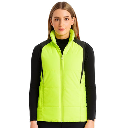 "ladies strike puffer vest in yellow, model front – ISUSI"
