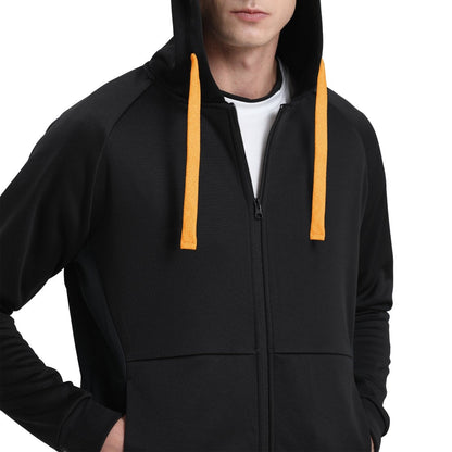 "wonder zip hoodie in Black with orange, model posed – Big Bee Workwear"