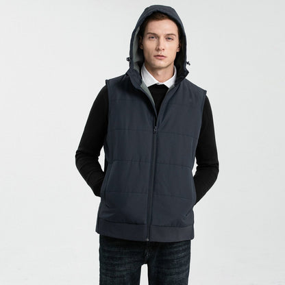 essential puffer vest in black, model in action – ISUSI