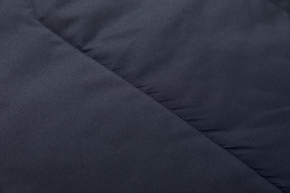 elite puffer vest fabric texture close-up – ISUSI