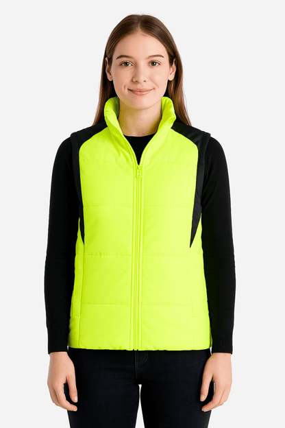 ladies strike puffer vest in yellow, model posed – ISUSI